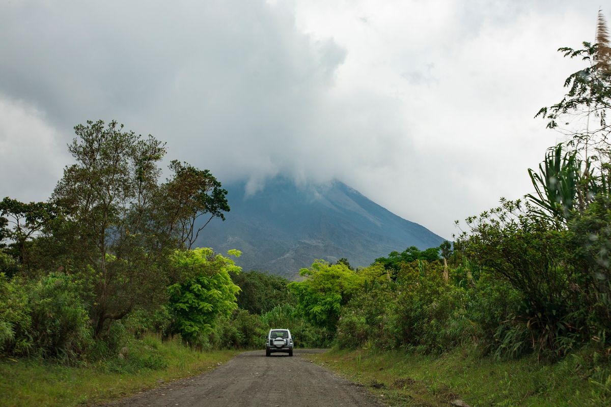 A road leading toward a volcano